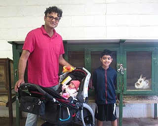 Neighbors | Zack Shively.Mill Creek MetroParks celebrated Kids to Park Day on May 19 with special events throughout their parks. The MetroParks Farm had a scavenger hunt for children and hike on a trail for the family. Pictured are the Ashraf family, Awais, Selma and Aadil, as they participated in the scavenger hunt.