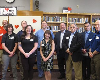 Neighbors | Zack Shively.Glenwood Junior High School had their third annual career day on May 17. The school's PTA brought in 70 speakers to the event. Pictured are speakers, from left, (front) humane agent Jessica MacMurchy, Sara Chill of Siffron, photographer Amanda Joy Bachinger, trustee Thomas Costello, business coach Scott Couchenour; (back) dog trainer Tim Patrick, corrections officer David Olsavsky, nurse Shane Pelanda, VP of Operations with L. Calvin Jones and Company John Russell and magistrate Dan Dascenzo.