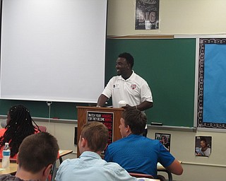 Neighbors | Zack Shively.Tracie Balentine, the PTA president, said that she invited speakers of various fields to the event, including a dog trainer, stuntman, politician and insurance agent, in order to give the students a chance to get many different perspectives on how to be successful. Pictured, Elliott Giles, president of Youngstown Youth Flag Football Association, answered questions at the end of his presentation.