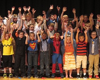 Neighbors | Zack Shively.Before each song, the students performed small skits to introduce the songs. Pictured, the students sang the theme song to "Spider-Man." A student dressed as the character introduced the song before they sang and danced to it.