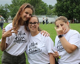 Neighbors | Abby Slanker.Canfield Village Middle School eighth-graders gathered outside to sign the T-shirts of their classmates during the school’s annual Eighth Grade Picnic on June 6.