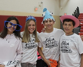 Neighbors | Abby Slanker.Canfield Village Middle School eighth-graders had fun with props at the photo booth during the school’s annual Eighth Grade Picnic.
