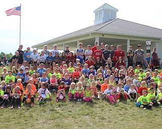 Neighbors | Abby Slanker.The Canfield Soccer Club Recreational League kicked off its season at the club’s annual Players Clinic at Herbert Road Fields on June 16, during which Canfield High School boys and girls soccer team members taught the players foot skills, practiced drills and played games.