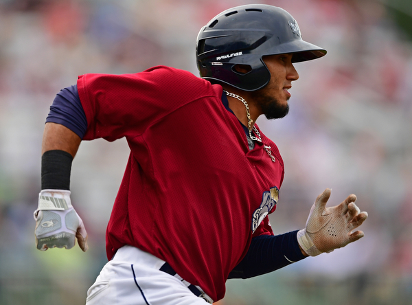 NILES, OHIO - JUNE 21, 2018: Mahoning Valley Scrappers' Elvis Perez sprints to first base for a RBI single in the third inning of a baseball game against the Auburn DoubleDays at Eastwood Field in Niles. DAVID DERMER | THE VINDICATOR