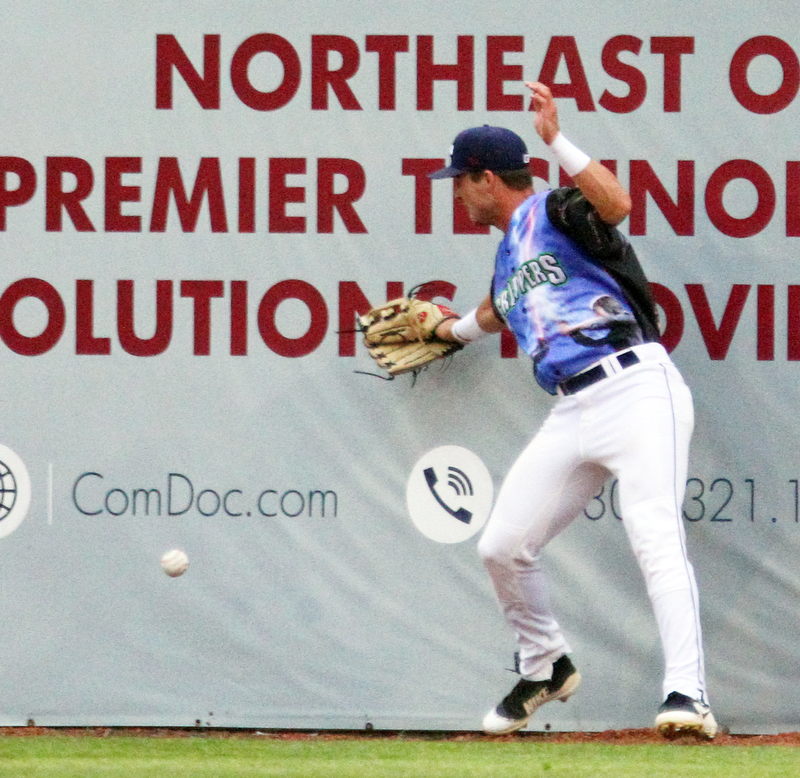 William D. Lewis The vindicator Scrappers righfielder Clark Scolamiero(11) misses a fly ball at the wall off the bat of Auburn's Gage Canning(14) during 6-22-18 action at Eastwood.