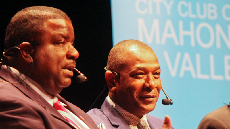 Youngstown Mayor Jamael Tito Brown, left, and Warren Mayor Doug Franklin participate in a City Club of the Mahoning Valley forum Monday at Packard Music Hall in Warren. 