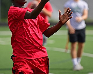 YOUNGSTOWN, OHIO - JUNE 25, 2018: Brandon Lee of Youngstown catches a pass during the Mooney football Camp of Champions, Monday morning at Cardinal Mooney High School. DAVID DERMER | THE VINDICATOR