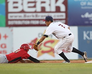 Scrappers second basemen Tyler Freeman (7) tags out Matt Vierling at second base for a double play after a line drive catch by Mahoning Valley's Elvis Perez in the top of the fifth inning during Monday evenings matchup against the Williamsport Crosscutters at Eastwood Field in Niles.