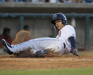 Tre Gantt (34) of the Scrappers slides safely into home in the bottom of the sixth inning during Monday evenings matchup against the Williamsport Crosscutters at Eastwood Field in Niles.