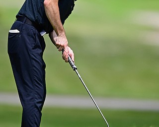 BOARDMAN, OHIO - JUNE 26, 2018: Seamus Chrystal of Hubbard follows his putt on the 18th hole, Tuesday afternoon at Mill Creek Golf Course during the Vindy Greatest Golfer. DAVID DERMER | THE VINDICATOR