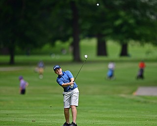 BOARDMAN, OHIO - JUNE 26, 2018: Ryan Sam of Boardman follows his approach shot on the ninth hole, Tuesday afternoon at Mill Creek Golf Course during the Vindy Greatest Golfer. DAVID DERMER | THE VINDICATOR