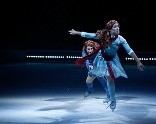 Madeline Stammen, front, performs as Crystal with her reflection, Mary Siegel, in Cirque Du Soleil Crystal in Covelli Centre on Wednesday.