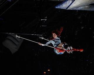 Madeline Stammen performs a trapeze act as Crystal in Cirque Du Soleil Crystal in Covelli Centre on Wednesday.