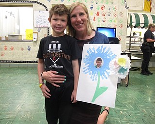 Neighbors | Zack Shively.Stadium Drive Elementary School had their annual Mother's Day Breakfast on May 11. The kindergarten teachers organized the event to give back to the students and mothers of the school. Pictured is Jen Flores with her son Michael at the breakfast.