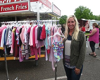 Neighbors | Zack Shively.Boardman Park had their 15th annual Baby Bargain Boutique on May 19. The park gave space to 150 families to sell their used children's items. Pictured is Stacie Hoover, a long-time visitor and vendor at the event.