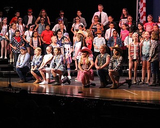 Neighbors | Abby Slanker.Fourth-graders line danced during the song “(That’s Why) They Call it Country” at the school’s annual performance of “Destination: America! An Evening of Art and Music” on May 30.