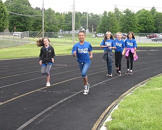 Neighbors | Zack Shively.In addition to an awards ceremony, the Dobbins students ran the track at the high school for a mini-Relay for Life. The students brought in donations during the day and ran the track during recess.