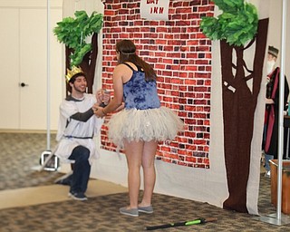 Neighbors | Jessica Harker .King Arthur proposed to Guinevere with audience assistance during the June 18 showing of The Tales of King Arthur at Austintown library.