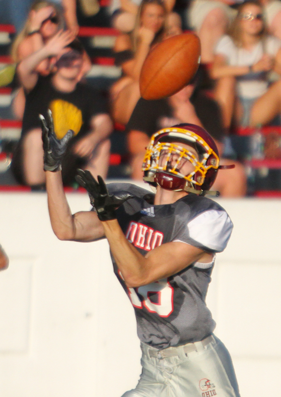 William D. Lewis The Vindicator Ohio'sMathias Combs(18) of Western Reserve pulls in a pass for a 2nd qtr TD during 6-28-18 Penn Ohio game in Salem.