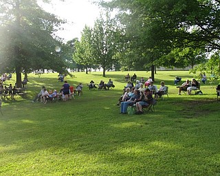 Neighbors | Jessica Harker.Community members gathered to watch the Frank Gallo Band on June 19 at Austintown park.
