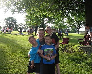 Neighbors | Jessica Harker.Christina Racich poses with her three sons, Eli Hoover, Liam Racich and Alexander Racich as they enjoy a pinic at the Frank Gallo Band concert June 19.