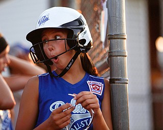 Poland's Nadia Zarbaugh cheers with her teammates during the district championship game against Canfield on Sunday.