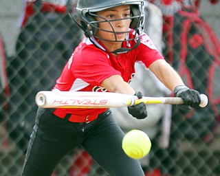 William D. Lewis The Vindicator  Canfield's (6) lays down a bunt during 7-2-18 win over Poland at Fields of Dreams.