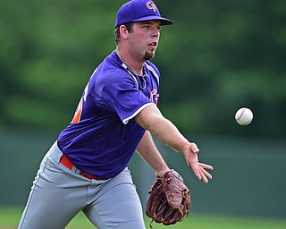 STRUTHERS, OHIO - JULY 3, 2018: Creekside starting pitcher Brandon Fleeger tosses to first base to get out Avalanche' Joe Proper in the second inning of a baseball game, Tuesday, July 3, 2018 in Struthers. DAVID DERMER | THE VINDICATOR
