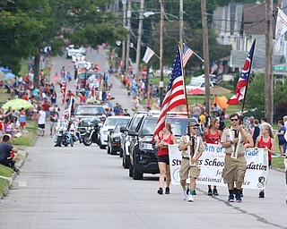 The Boy Scouts held flags at the start of the parade as it traveled up Sexton street during the Struthers Fourth of July Parade on Wednesday afternoon.  Dustin Livesay  |  The Vindicator  7/4/18  Struthers