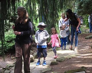 Neighbors | Zack Shively.Mill Creek MetroParks had a Children's Nature Hour program at Fellows Riverside Gardens on June 7. The program focused on the different observable wildlife in the gardens. Pictured, naturalist Marilyn Williams led families through the gardens during the program.