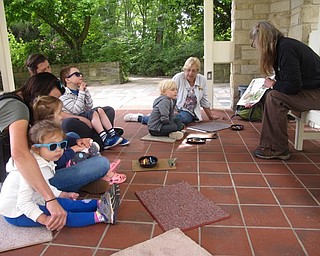 Neighbors | Zack Shively.June's Children's Nature Hour program featured a story time where naturalist Marilyn Williams read "Quiet in the Garden" by Aliki. The program began in the Kidston Pavilion at Fellows Riverside Gardens.