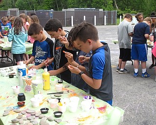 Neighbors | Zack Shively.The Dobbins Elementary students had a number of activities in the school's parking lot during their fun day. The students painted rocks as a project and had frozen treats from Kona Ice.
