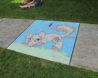 Neighbors | Jessica Harker.Madison Myers won the cartoon portion of the Chalk the Walk competition for her drawing on June 30 at Celebrate Poland.