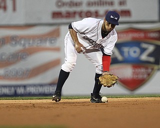 Jose Fermin (12) of the Scrappers scoops a ground ball during the top of the second inning against Batavia at Eastwood Field on Thursday evening. Dustin Livesay  |  The Vindicator  7/5/18  Niles