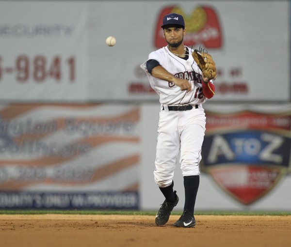 Jose Fermin (12) of the Scrappers throws to first base during the top of the second inning against Batavia at Eastwood Field on Thursday evening. Dustin Livesay  |  The Vindicator  7/5/18  Niles