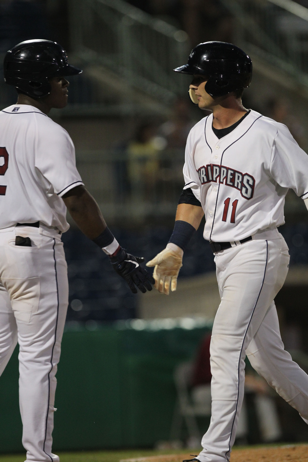 Hosea Nelson (left) and Clark Scolamiero (right) shake hands after Scolamiero crossed home plate during the bottom of the second inning against Batavia at Eastwood Field on Thursday evening. Dustin Livesay  |  The Vindicator  7/5/18  Niles