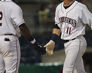 Hosea Nelson (left) and Clark Scolamiero (right) shake hands after Scolamiero crossed home plate during the bottom of the second inning against Batavia at Eastwood Field on Thursday evening. Dustin Livesay  |  The Vindicator  7/5/18  Niles