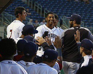 Richie Palacios (17) of the Scrappers (center) gets greeted by his teammates in the dugout after hitting a home run during the bottom of the first inning against .batavia at Eastwood Field on Thursday evening. Dustin Livesay  |  The Vindicator  7/5/18  Niles