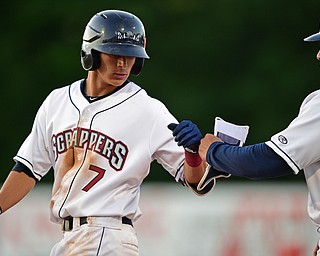 NILES, OHIO - JULY 6, 2018: Mahoning Valley Scrappers' Tyler Freeman is congratulated by Omir Santos after hitting a RBI single in the third inning of a baseball game against the Batavia Muckdogs, Friday, July 6, 2018, in Niles. DAVID DERMER | THE VINDICATOR