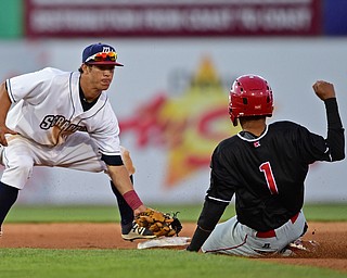 NILES, OHIO - JULY 6, 2018: Mahoning Valley Scrappers' Tyler Freeman tags out Batavia Muckdogs' Gerards Nunez after he was caught trying to steal second base in the fourth inning of a baseball game against the Batavia Muckdogs, Friday, July 6, 2018, in Niles. DAVID DERMER | THE VINDICATOR