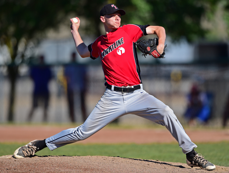 STRUTHERS, OHIO - JULY 7, 2018: KnightLine starting pitcher Tommy Pitch delivers in the first inning of a baseball game against Astro, Saturday, July 7, 2018, in Struthers. DAVID DERMER | THE VINDICATOR