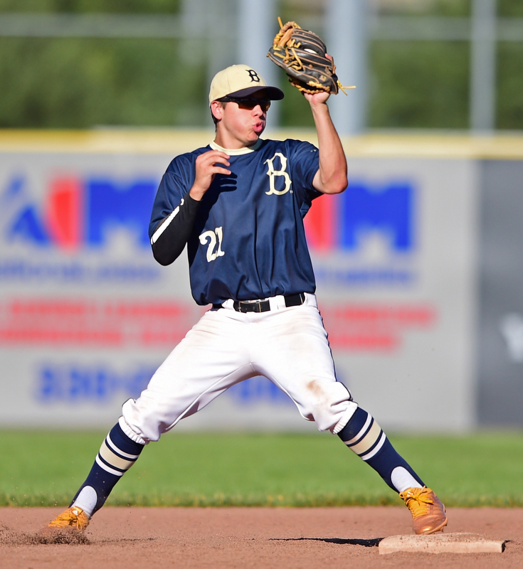STRUTHERS, OHIO - JULY 7, 2018: Baird Brothers' Jacob McCaskey steps on second base to start a double play in the fifth inning of a baseball game against Roth Brothers, Saturday, July 7, 2018, in Struthers. DAVID DERMER | THE VINDICATOR