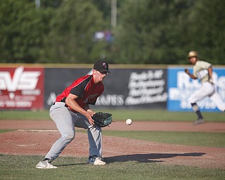 Knightline's Adam Jannette fields the ball in the third inning of the Class B tournament game against Baird Brothers on Tuesday.