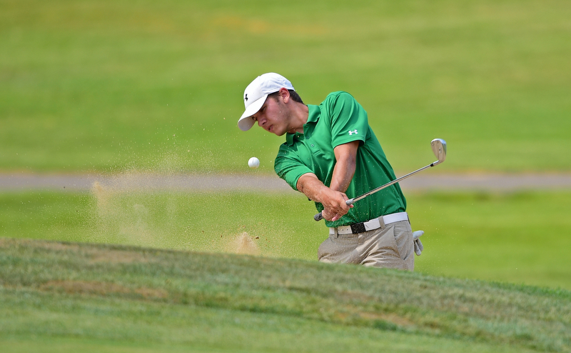 SALEM, OHIO - JULY 10, 2018: Kyle Koziel of Poland follows his shot from the sand trap on the 16th hole during the Vindy Greatest Golfer Qualifier, Tuesday afternoon at Salem Hills Golf Course. DAVID DERMER | THE VINDICATOR