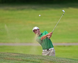 SALEM, OHIO - JULY 10, 2018: Kyle Koziel of Poland follows his shot from the sand trap on the 16th hole during the Vindy Greatest Golfer Qualifier, Tuesday afternoon at Salem Hills Golf Course. DAVID DERMER | THE VINDICATOR