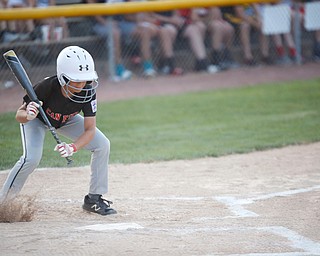 Canfield's Zain Jadallah pulls back his back as a pitch bounces past him during the Little League baseball 11-U playoff game against Boardman on Wednesday.