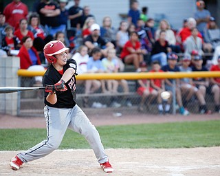 Canfield's AJ Hewko swings at the ball during second inning of the Little League baseball 11-U playoff game against Boardman on Wednesday.