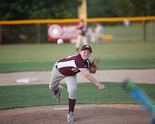 Boardman's Ryan Neifer pitches the ball to Canfield during the Little League baseball 11-U playoff game on Wednesday.