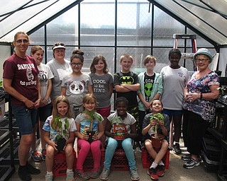 Neighbors | Zack Shively.Market Street Elementary School's Sprouting Spartans CLub had a plant sale on May 23. They grew the plants they sold. The sale benefitted the group in hopes of making the club more self-sufficient. Pictured is the group with advisors and leaders Natalie Winkle and Angela Burns. An advisor not pictured is Kim Noday.