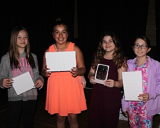 Neighbors | Abby Slanker.A group of Canfield Village Middle School fifth-grade students completed the task of guiding a laser through a maze during the school’s STEM Day on May 21.